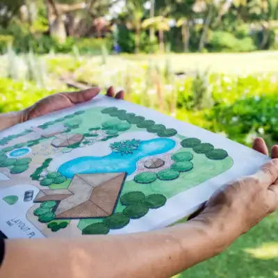 Hand-drawn budget garden layout with pond, shrubs and house