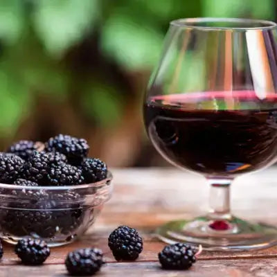 Blackberries with wine glass from TN Nursery
